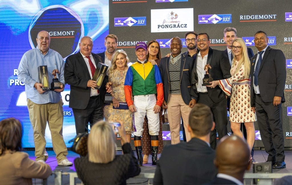 Humdinger's winning connections on stage with their silverware. Images: Candiese Lenferna